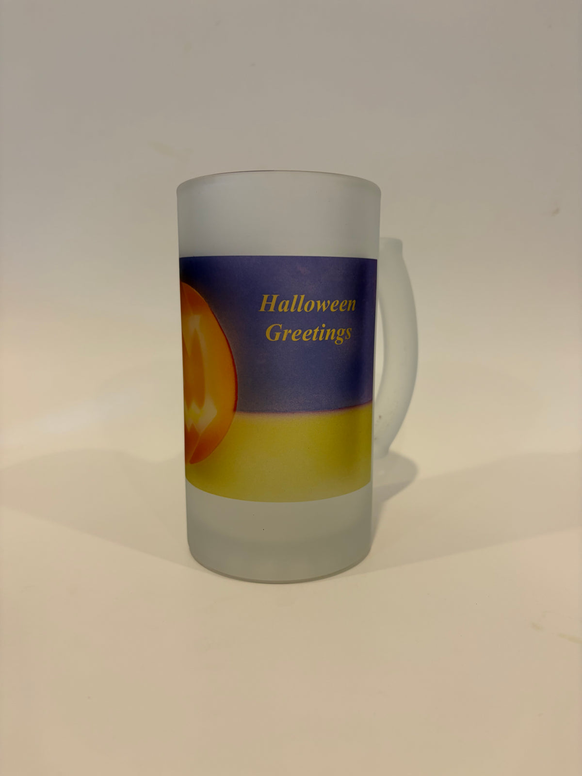 Jack O'Lantern Pumpkin With Halloween Greetings As A Frosted Glass Beer Mug