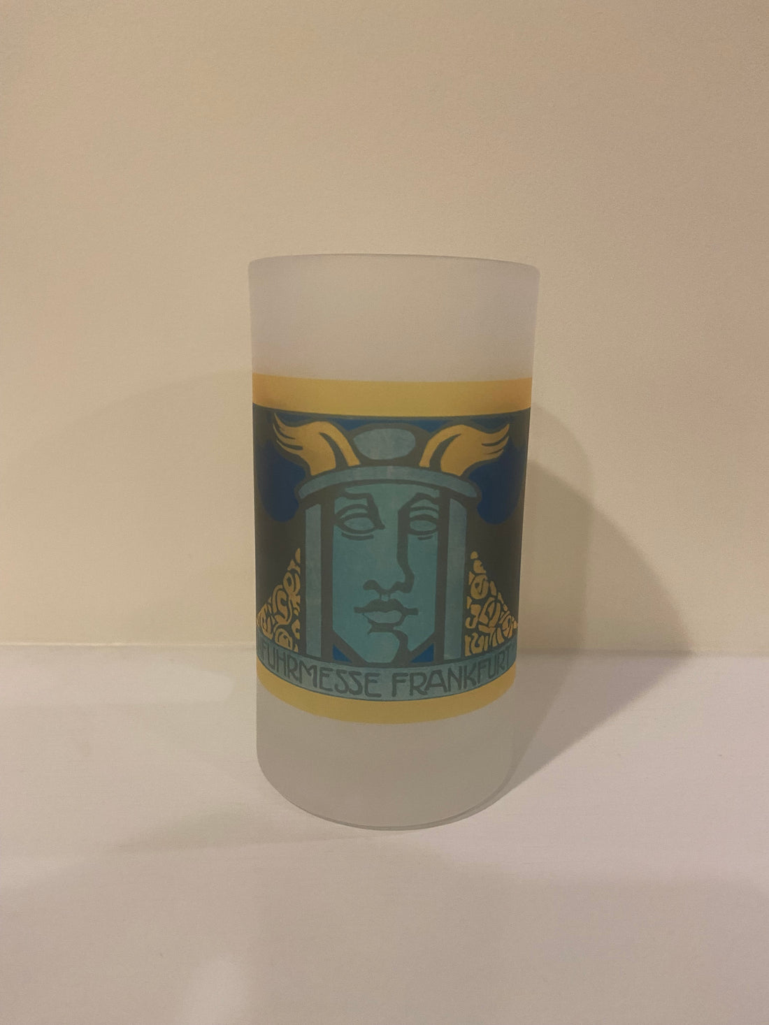 Winged Face of Teutonic Character on Frosted Glass Beer Mug