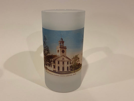 Frosted glass with a printed design of a building on a plain background