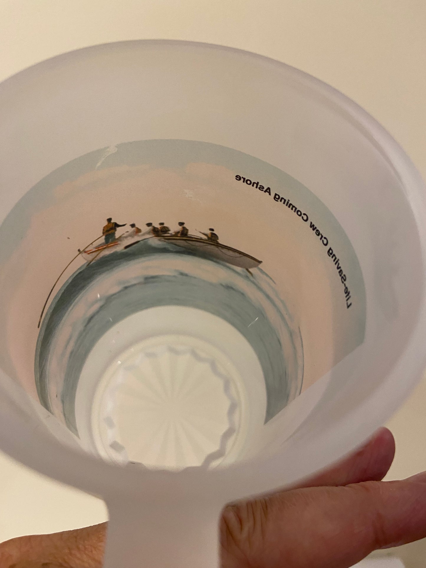 Life-Saving Crew Coming Ashore As A Frosted Glass Beer Mug