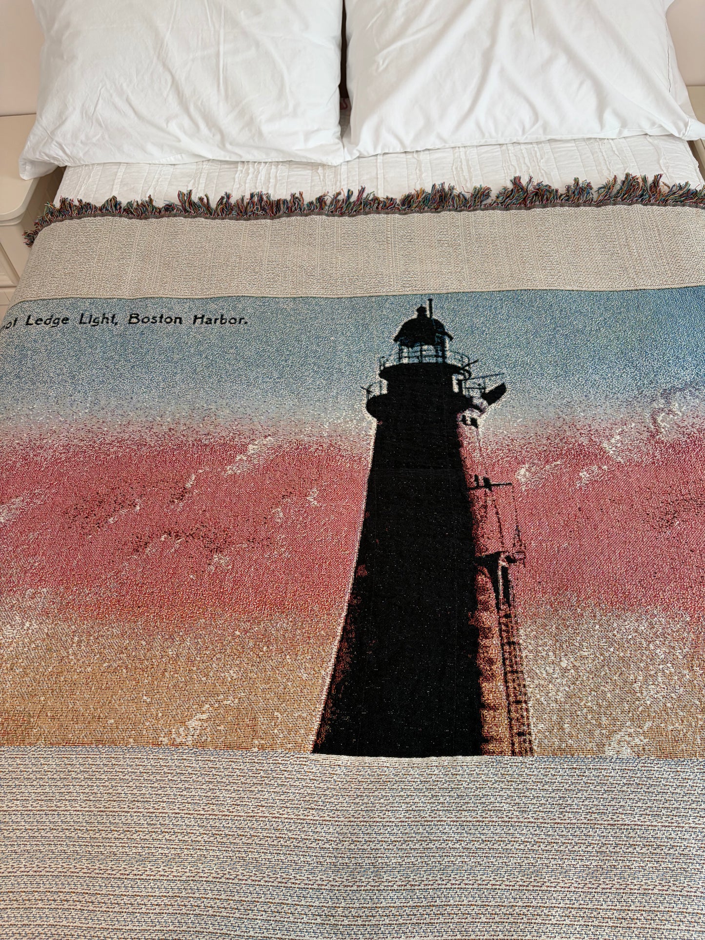 Jacquard Weave Cotton Throw Blanket of Minot's Light Against A Pink Sky