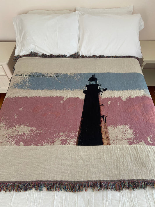 Jacquard Weave Cotton Throw Blanket of Minot's Light Against A Pink Sky