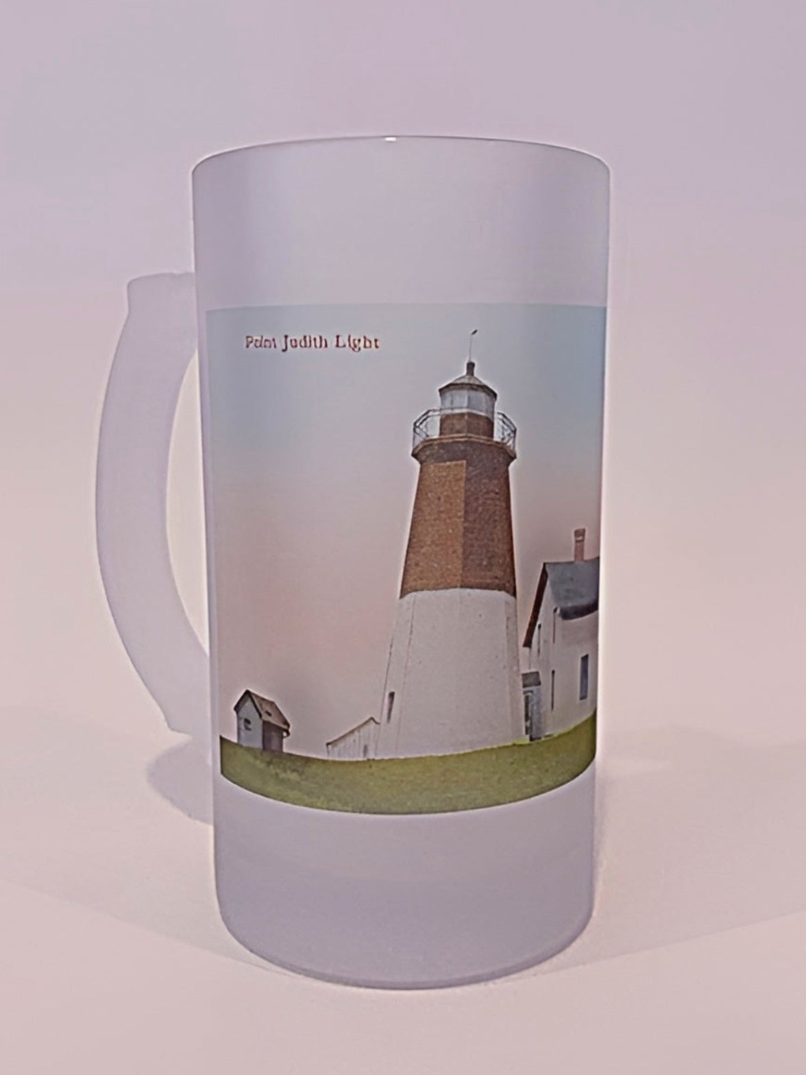Mug with a lighthouse design on a white background