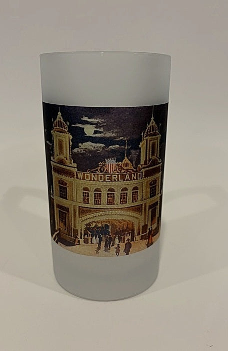 Tumbler with a printed design of a building labeled 'Wonderland' on a white background